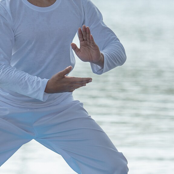 Person doing tai chi massage