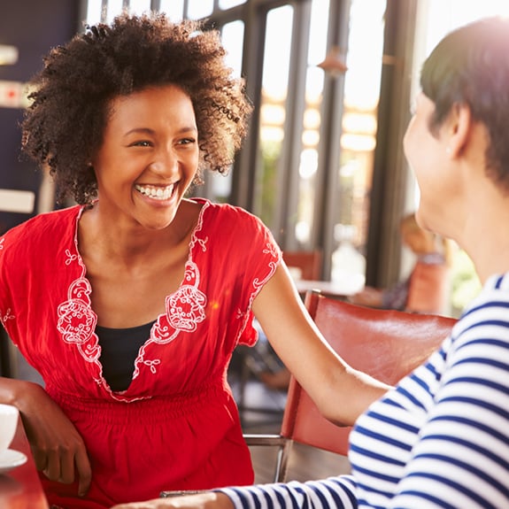Two friends laughing
