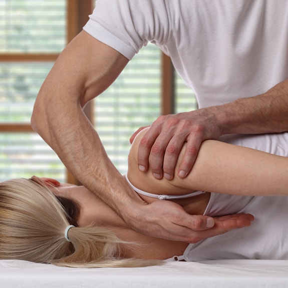 Person laying down getting back adjustment